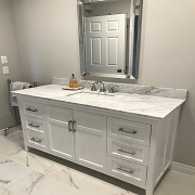 Modern white vanity with carrera top