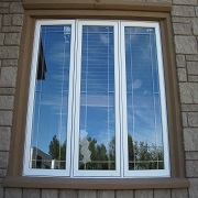 Large patio window on brick house