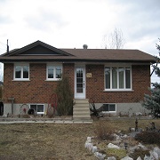 All new windows and doors on brick home